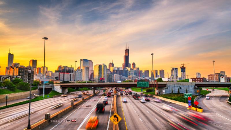 Landscape view of a main highway leading into a large city