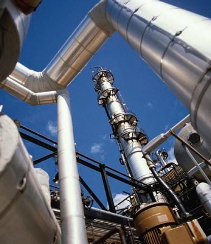 Pipes and smokestacks at a chemical facility.